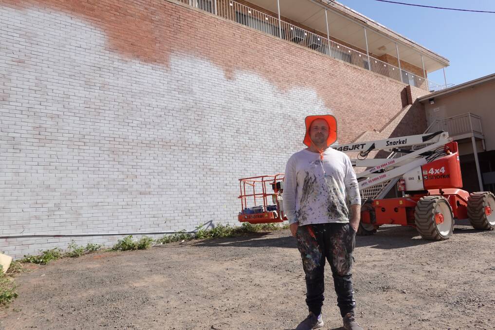 Reubszz will be turning this wall into a depiction of a local Riverina farmer. PHOTO: Monty Jacka