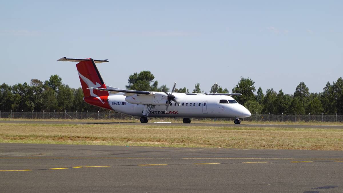 The turboprop 50-seat Q300 aircraft landed at Griffith Airport at midday. Photo: Monty Jacka