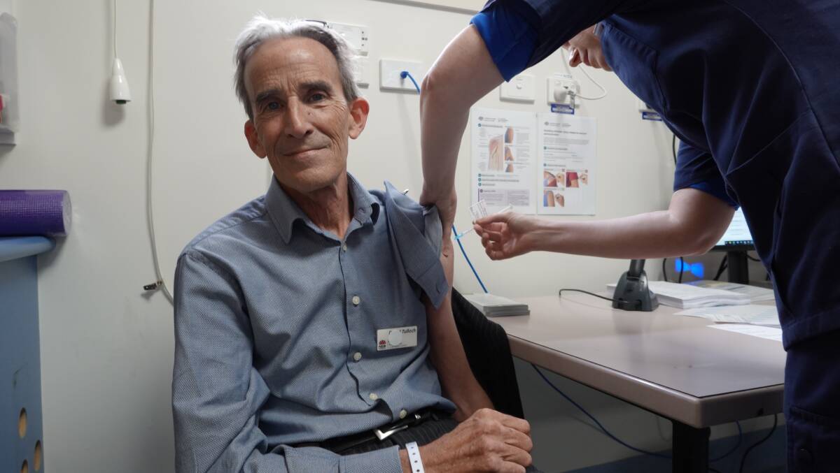 Griffith Base Hospital's director of medical services Dr David Tulloch receiving the Astra Zeneca vaccine. Photo: Monty Jacka.