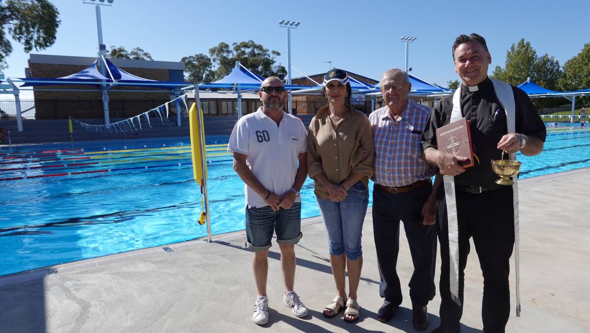 Deputy Mayor Simon Croce, Councillor Christine Stead, Mayor John Dal Broi, and Father Andrew Grace alongside the new pool. Picture: Monty Jacka.
