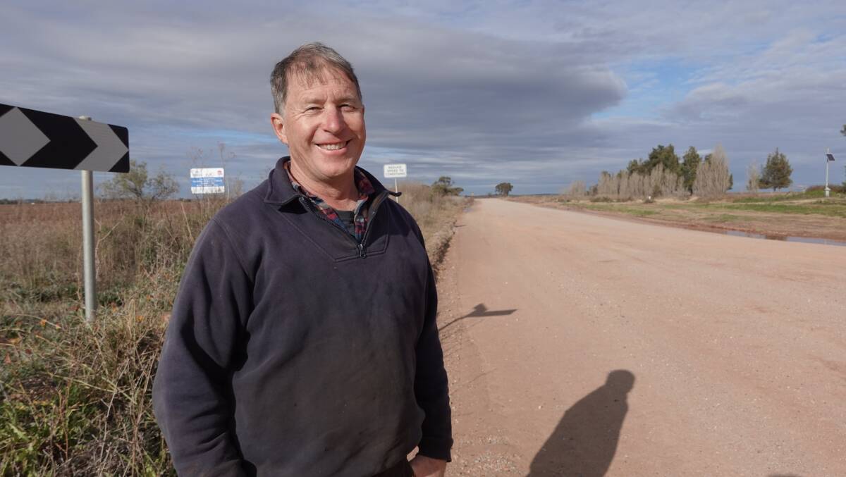 GRINNING: Farmer Rodney Guest said it is 'great' that the sealing of Boorga Road is finally underway. PHOTO: Monty Jacka