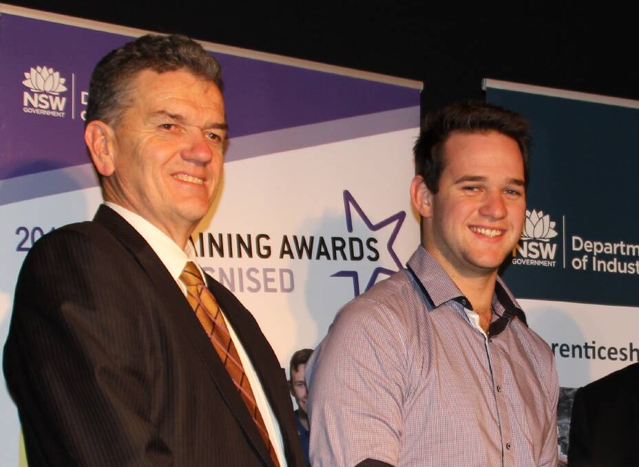 Training Services NSW executive director David Collins with apprentice of the year Michael Johnston