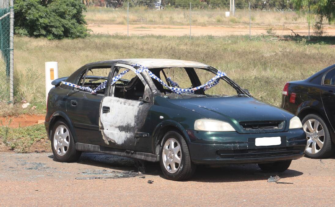 BURNT: Police were called to a car fire along Banna Avenue in the early hours of Sunday, as police urge community members to ensure their vehicles are let secured and not left unattended along the main road. PHOTO: Calhan Behrendt