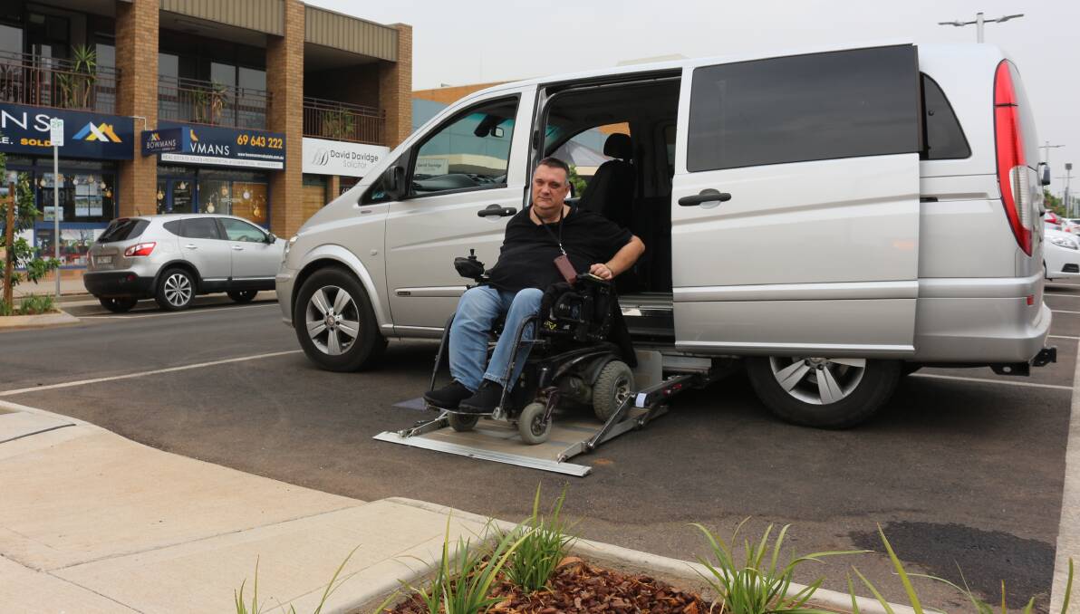 NOT UP TO SCRATCH: Developer Zep Lanza said the lack of a designated shared space means he needs to park on the line in order to safely exit the vehicle. PHOTO: Calhan Behrendt
