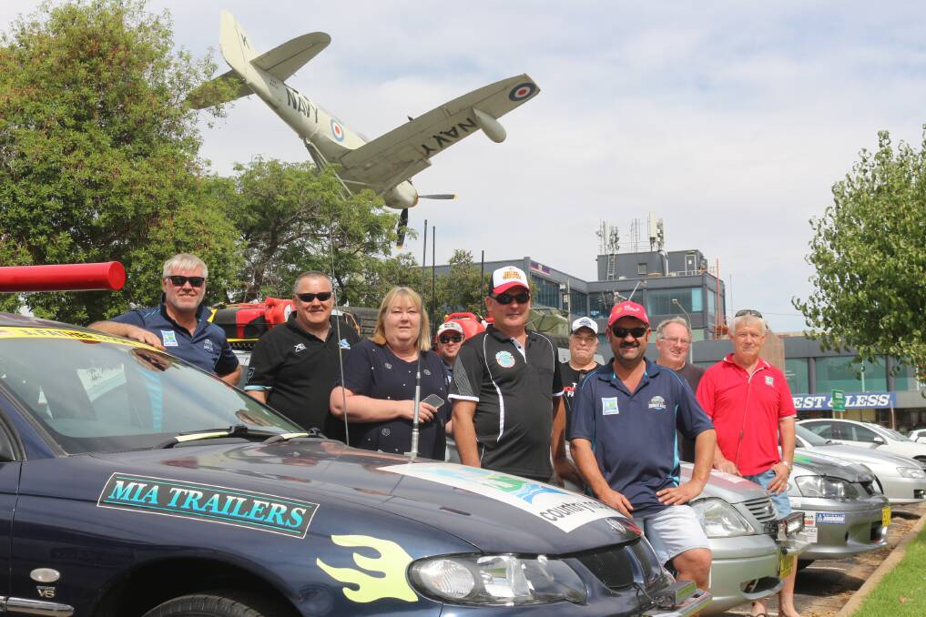 RARING TO GO: A group of drivers from Griffith prepare for the long trek to Nelson Bay as part of this year's Riverina Redneck Rally. PHOTO: Calhan Behrendt