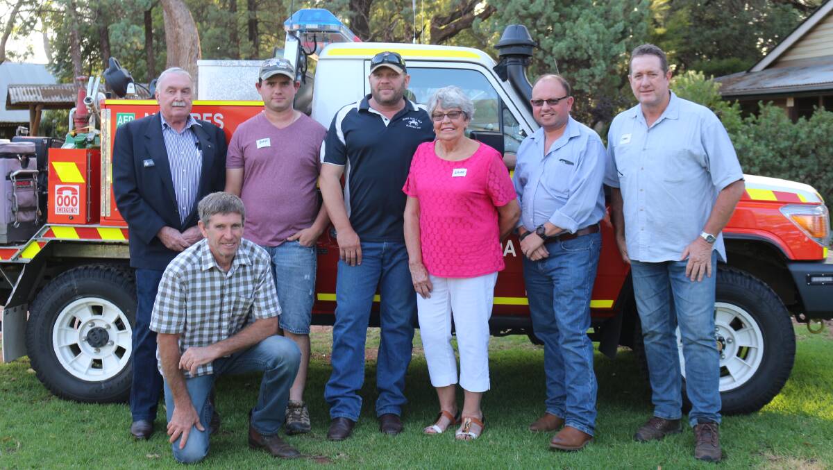 USEFUL FUNDS INBOUND: Representatives from the eight RFS brigades (except Kooba) accepted the donation from members of the Lions Club during a dinner on Wednesday. PHOTO: Calhan Behrendt