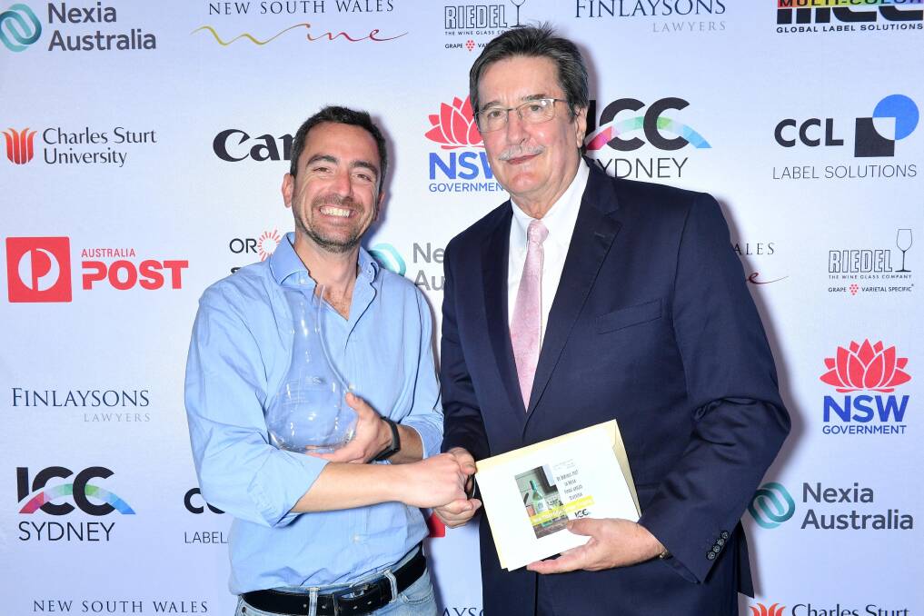 PERFECT PINOT: De Bortoli winemaker Matteo Lapi accepting the Best Pinot Grigio/Gris award from ICC Sydney CEO Geoff Donaghy. PHOTO: Supplied.