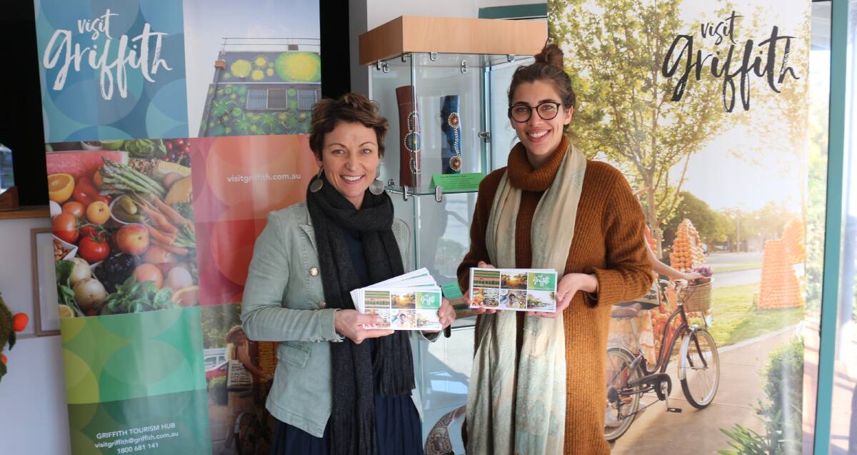 SHARE THE GOOD NEWS: Griffith City Council's tourism manager Mirella Guidolin and marketing and promotions coordinator Ruby Blumer are hoping locals jump on board and help spread the word about what makes Griffith great through the tourism team's postcard campaign. PHOTO: Calhan Behrendt