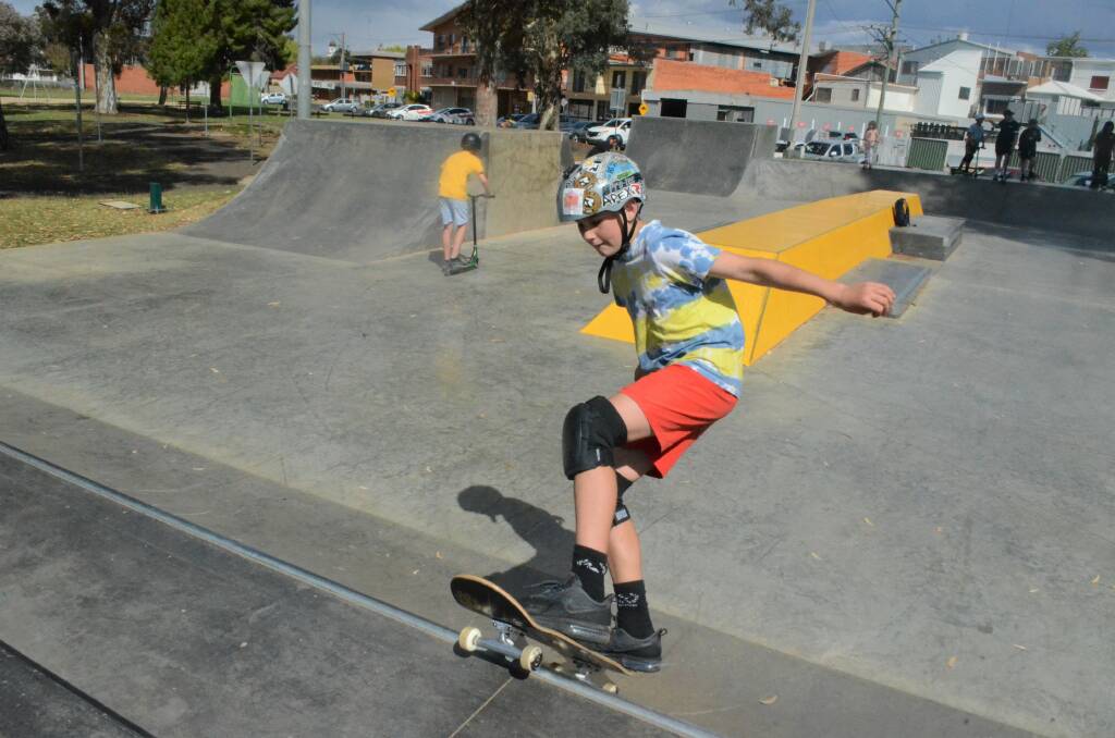 SKATING SKILLS: Tennyson Sales shows off his skills by cruising up a ramp during the skating event at Griffith Skate Park. PHOTO: Calhan Behrendt