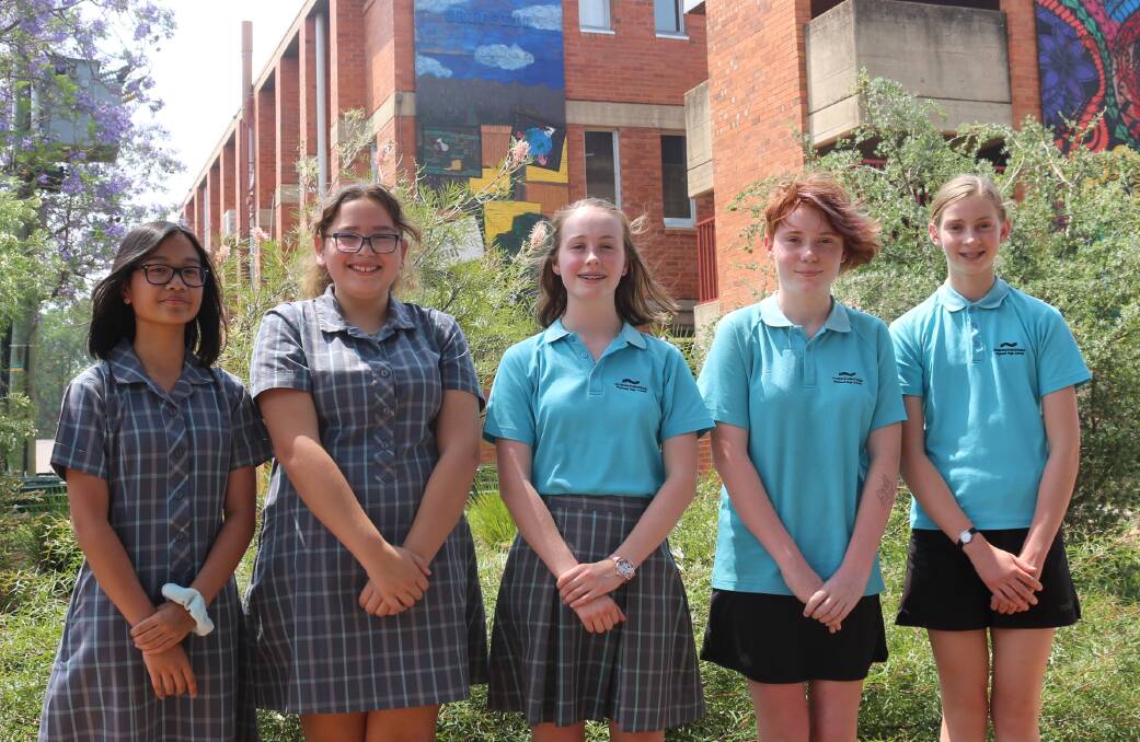 DEBATING FOR GLORY: Raisa Cabahug, Laiza Anaya, Hannah Mitchell, Aoibhinn Robinson and Laura Weppler will be out to claim the title as the best debaters in the state when they head to Sydney for the Premier's Debating Challenge finals. PHOTO: Calhan Behrendt