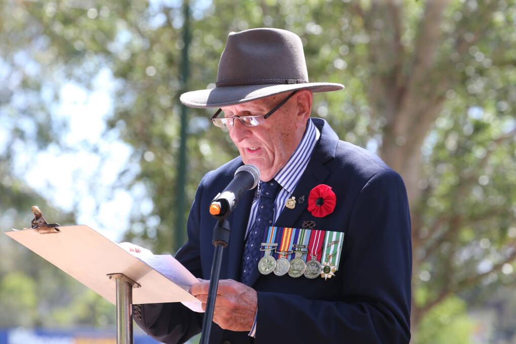 STOPPING AND REFLECTING: Griffith RSL sub-branch member Terry Walsh speaks during the 2017 Remembrance Day service. PHOTO: Anthony Stipo