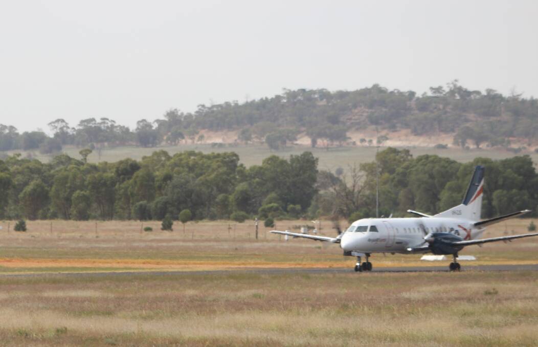 STAYING IN THE AIR: A Regional Express plane departs from Griffith Airport, with two services planned to be running under a new proposed schedule. PHOTO: Calhan Behrendt