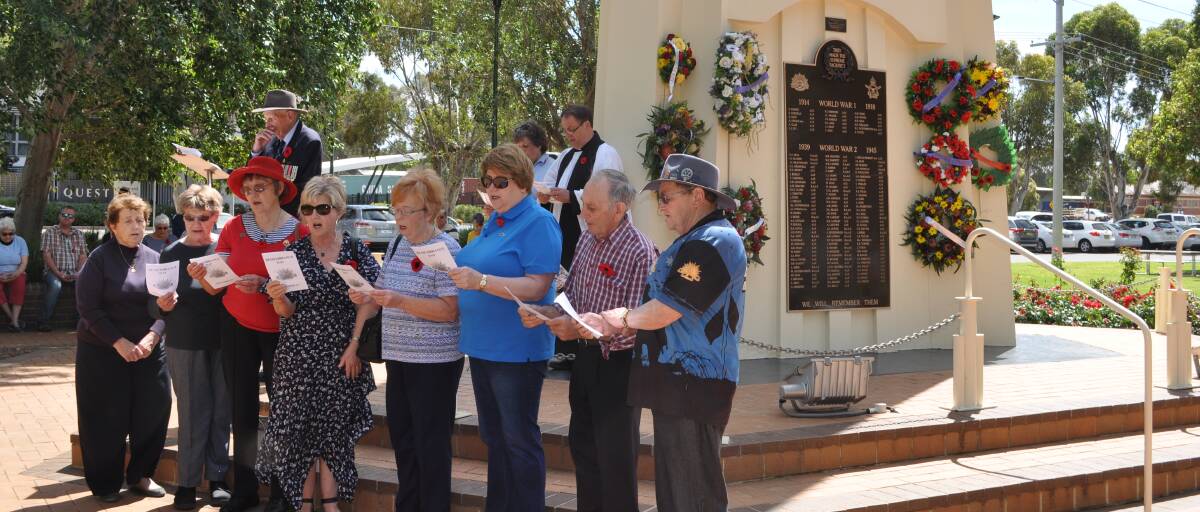 LEST WE FORGET: Members of the Sing Australia choir perform during the Remembrance Day service. PHOTO: Denny Fachin