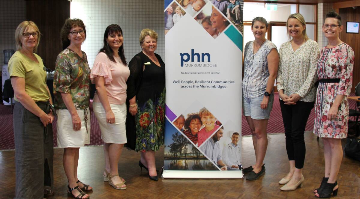 HELPING HAND: Trusted Advocates Suzanne Litchfield, Pauline Hatherley, Julie Andreazza, Sue Kilham and Tracey Lewis with Member for Farrer Sussan Ley and MPHN senior manager for mental health, Anita McRae. PHOTO: Supplied