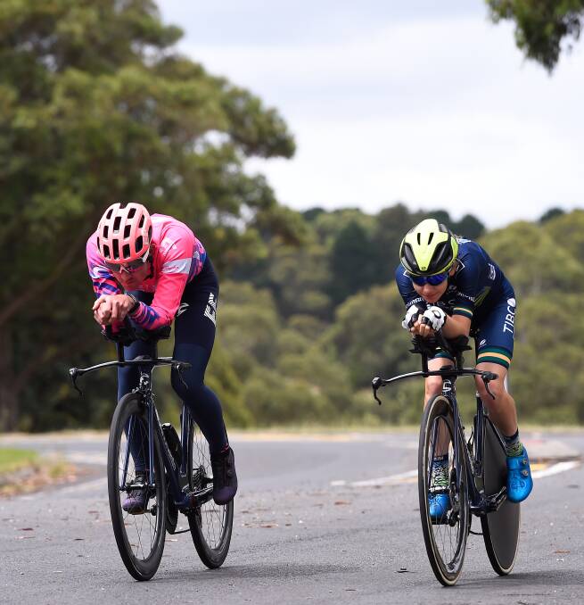 YOUNG GUNS: James Whelan and Sarah Gigante in time trial mode at Fed Uni at the AusCycling Road National Championships launch on Thursday. Picture: Adam Trafford
