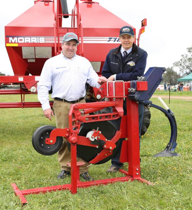 Michael McCormick, Morris Industries, and HMFDs Matt Bergmeier with the RAZR Disc Drill, voted the winner by a panel of regional primary producers as the field days 50th anniversary in 2013 following a solid nine hours of judging.