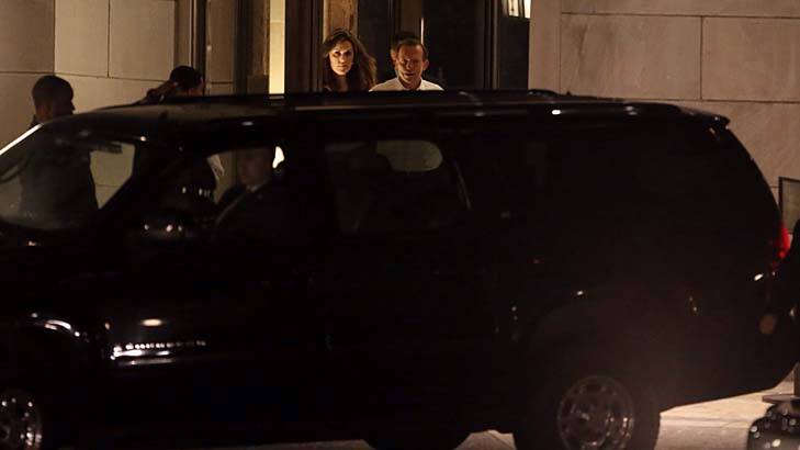 Mr Abbott and Ms Credlin emerge at 10.19pm from the lobby of Rupert Murdoch's apartment in Central Park West, New York. Photo: Andrew Meares