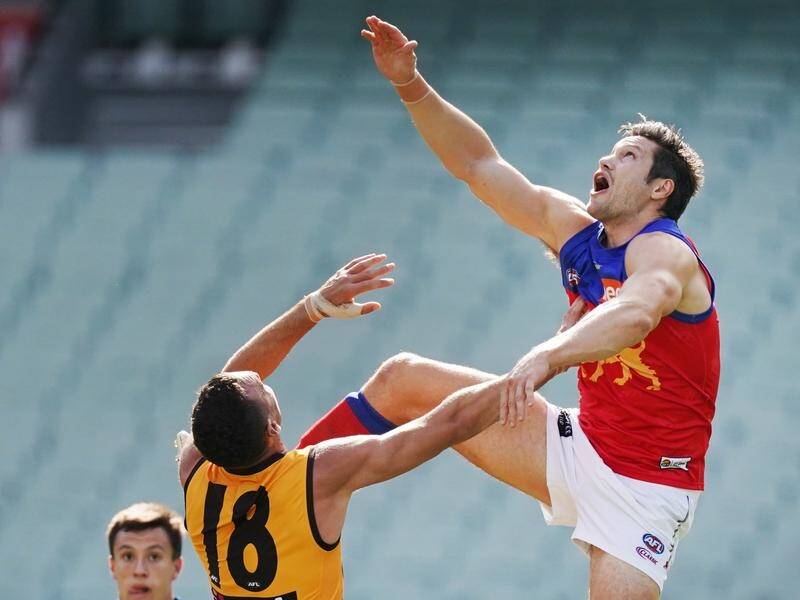 Brisbane's Stefan Martin (r) is set to return from an ACL injury when the AFL season resumes.