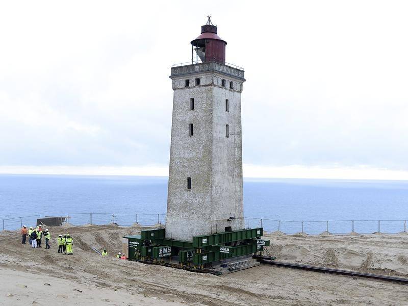 The 120-year-old lighthouse Rubjerg Knude Lighthouse is being moved in northwestern Denmark.