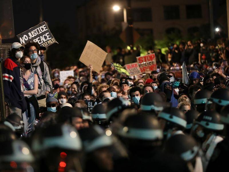 Curfews and the president's warnings of a crackdown didn't deter mass protests in several US cities.