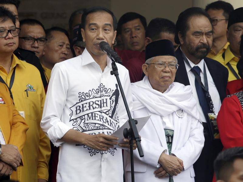 Joko Widodo, center left, has picked Ma'ruf Amin, center right, as his running mate for 2019.