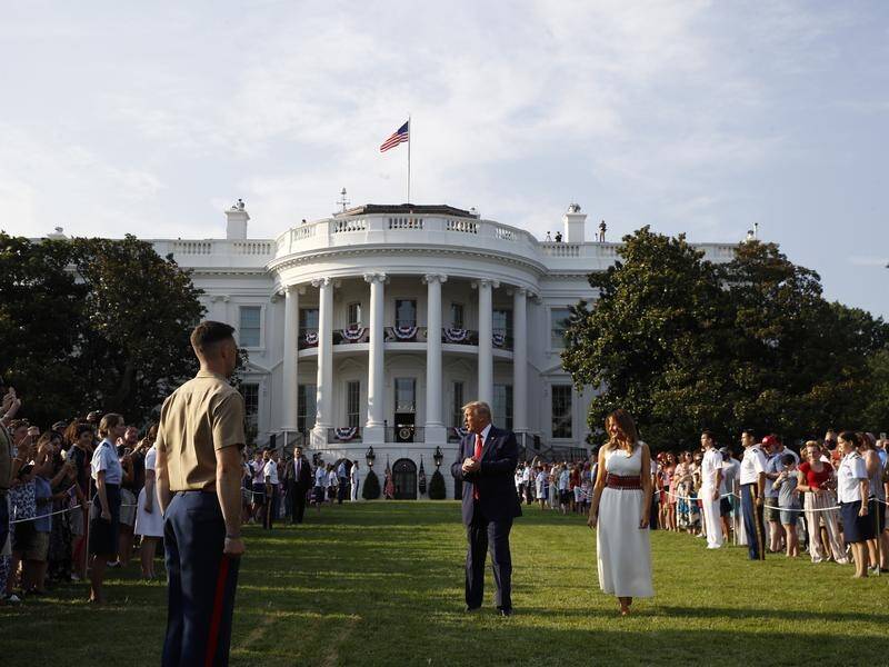 Hundreds of guests assembled on the White House South Lawn for July 4 celebrations.