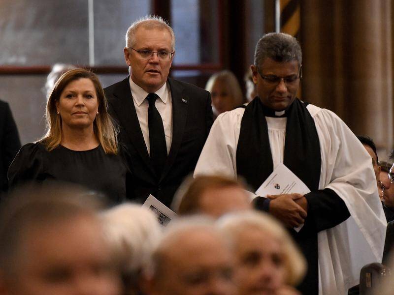 Kanishka Raffel with Scott and Jenny Morrison at the Sydney service to honour Prince Philip.