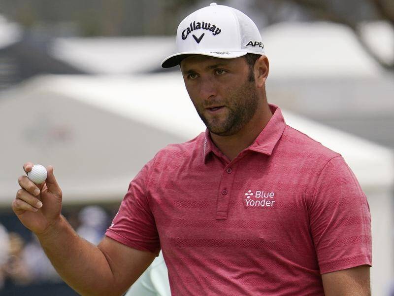 World No.1 golfer Jon Rahm is hurting watching golf get underway in Tokyo from his home in the US.