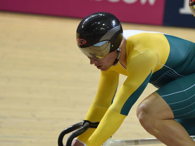 The Australian Paralympic cycling team will have Kieran Modra (R) in their thoughts in Tokyo.