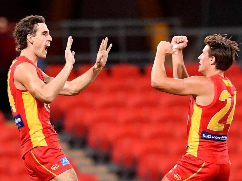 Gold Coast will play their first three games after the AFL restart at Metricon Stadium.