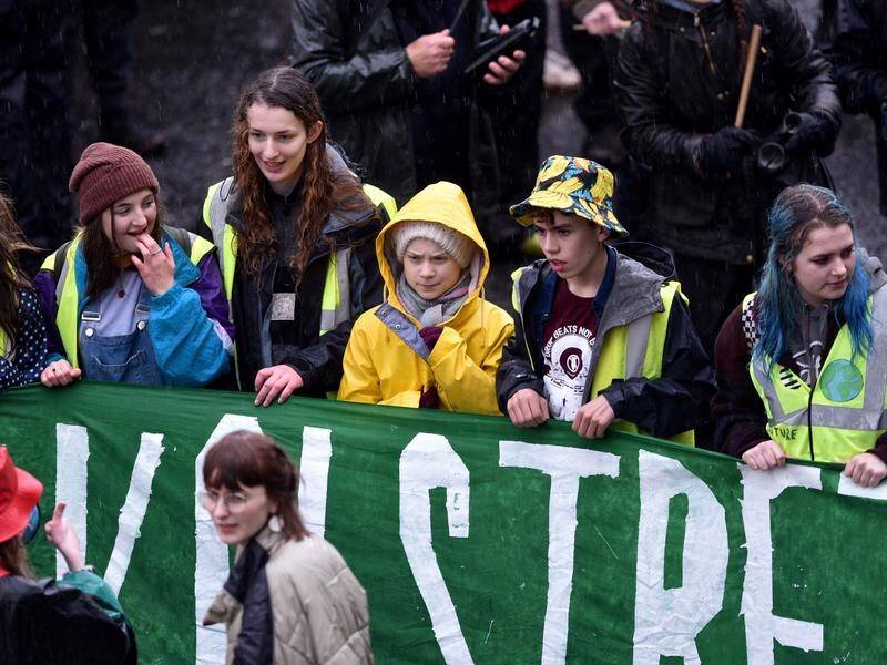 Climate campaigner Greta Thunberg has marched through Bristol in the UK with fellow activists.