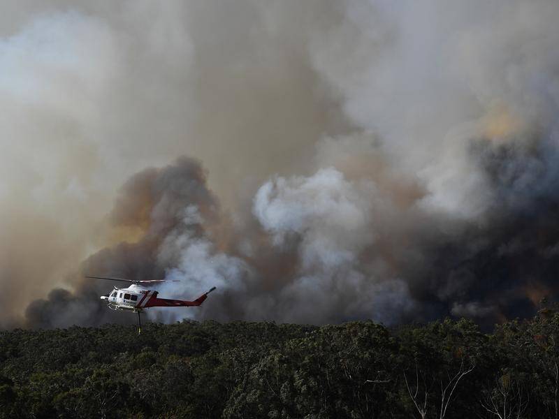 The RFS says the loss of a water bomber's three crew shows the extreme danger of fighting fires.
