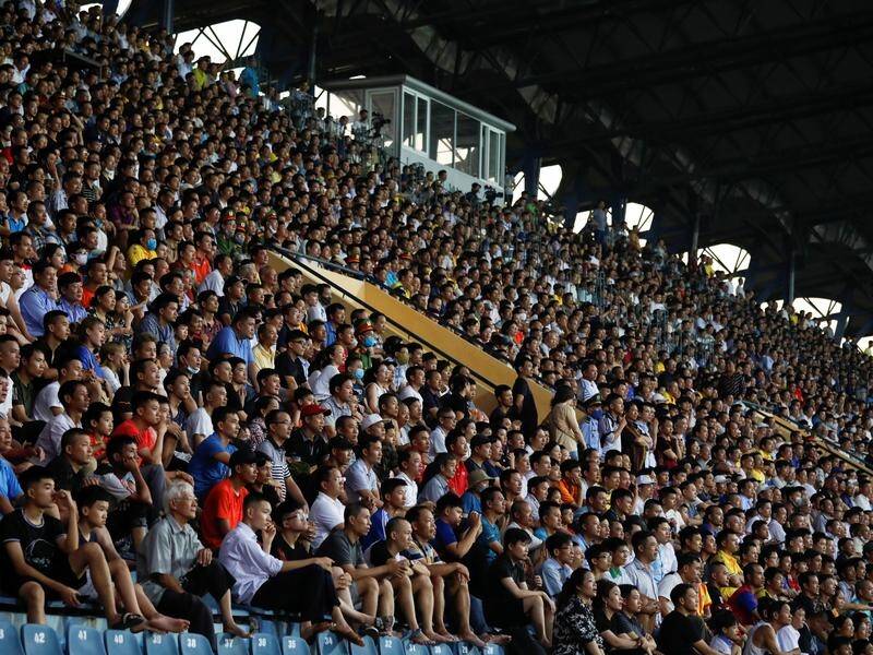 Football fans in Vietnam flocked back to watch their teams on Friday.