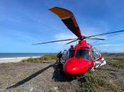 A rescue helicopter flew the man from Clack Island in a serious but stable condition. (HANDOUT/QUEENSLAND AMBULANCE SERVICE)