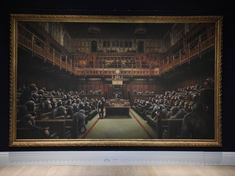 British artist Banksy's work Devolved Parliament has sold for a record $A18 million at auction.