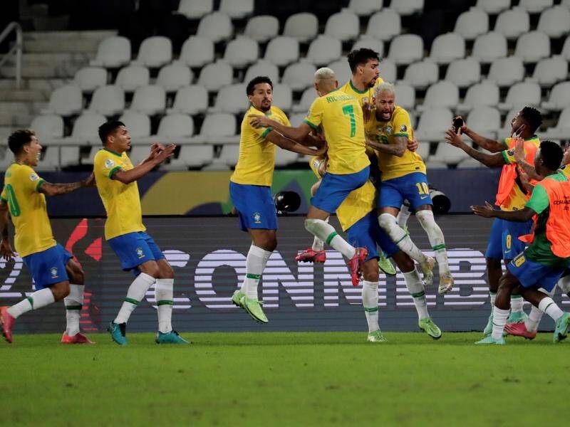 Brazil celebrate their late winner in the 2-1 victory over Colombia in Copa America.