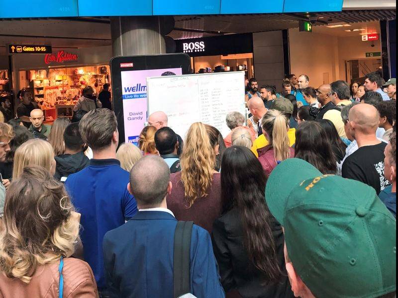 Passengers had to check whiteboards after an IT glitch caused Gatwick Airport's displays to fail.