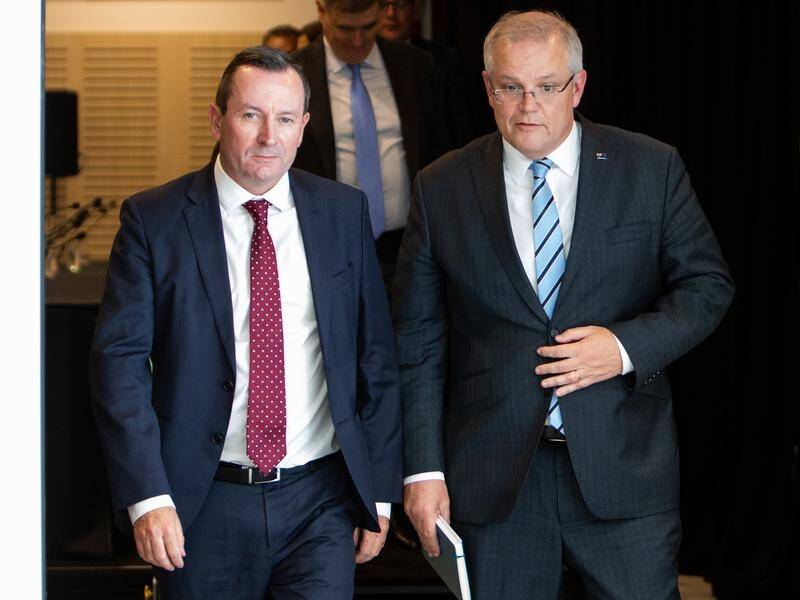 WA Premier Mark McGowan (left) says Scott Morrison is trying to boss around the states.