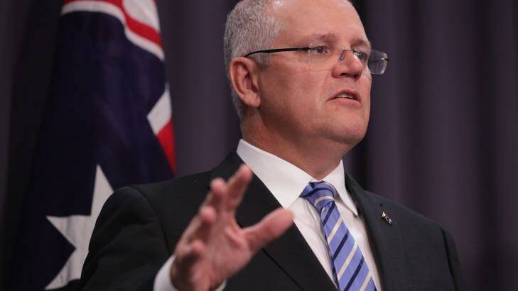 Treasurer Scott Morrison has spruiked tax cuts but they could hurt the economy initially. Photo: Andrew Meares
