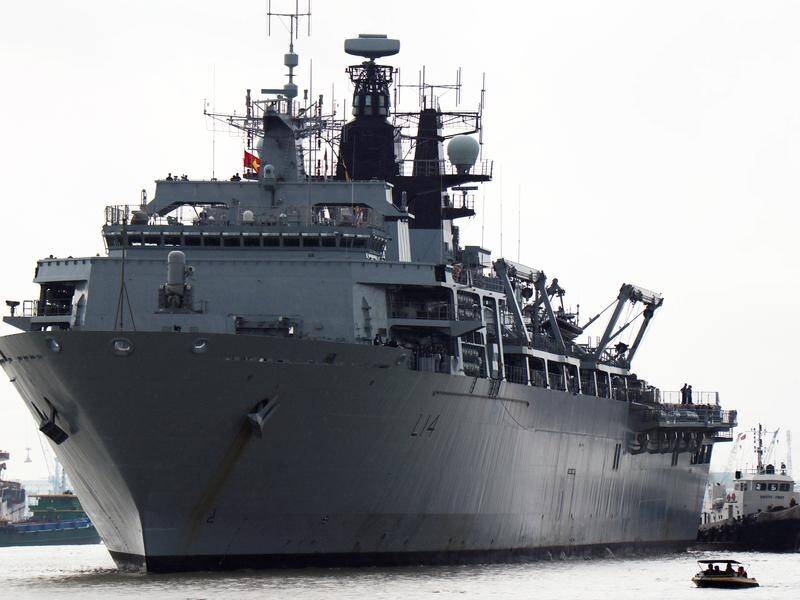China has warned the UK ties are at risk after HMS Albion passed close to disputed islands.