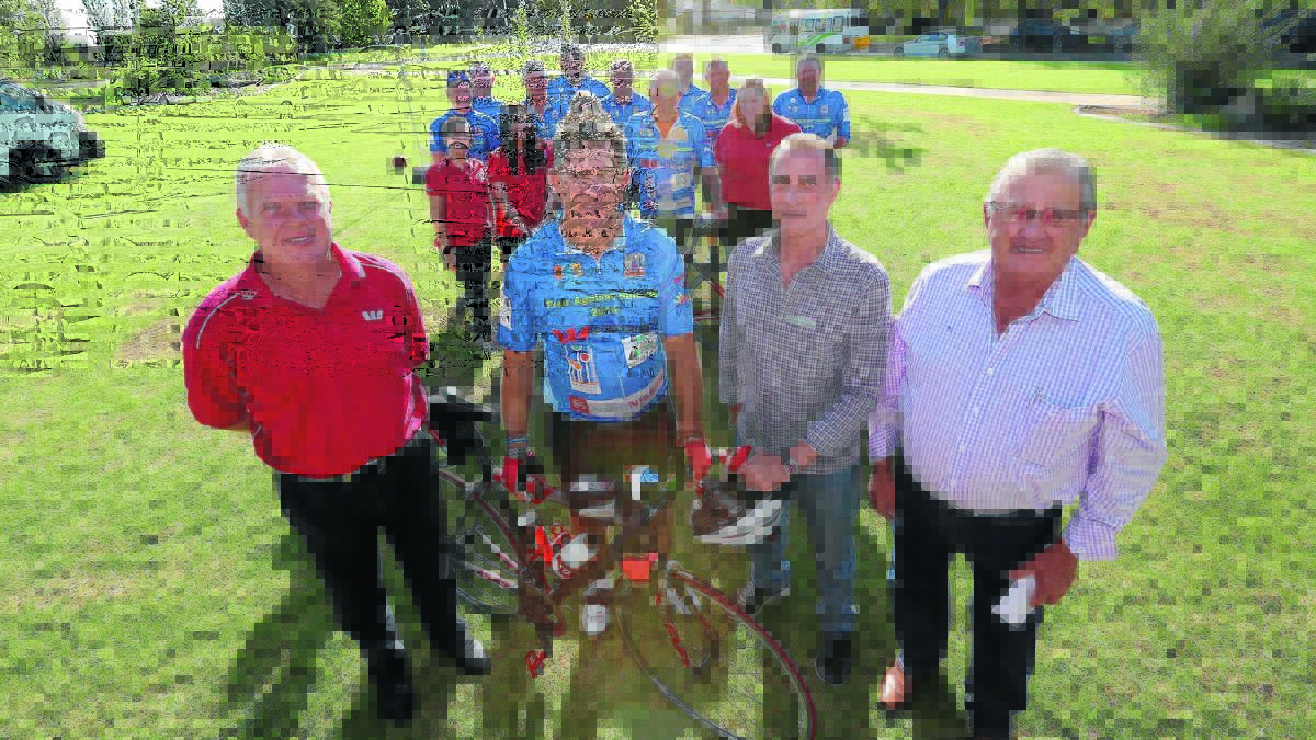 RIDING FOR A CAUSE: Lee Kimball from Wespac, CASE leader Peter Dwyer, George Der Matossian from Westpac and Mayor John Dal Broi celebrate the CASE riders making it safely to Griffith from Hay. 