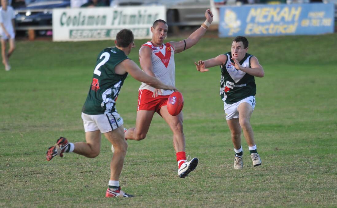 STAR OF THE SHOW: Griffith recruit Michael Handby drives the Swans forward on Sunday against Coolamon.