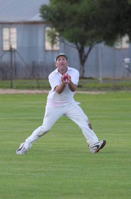 WELL TAKEN: Diggers' John Moran holds his nerve and holds onto this catch during Sunday's GDCA second-grade grand final against the Coly Nomads.