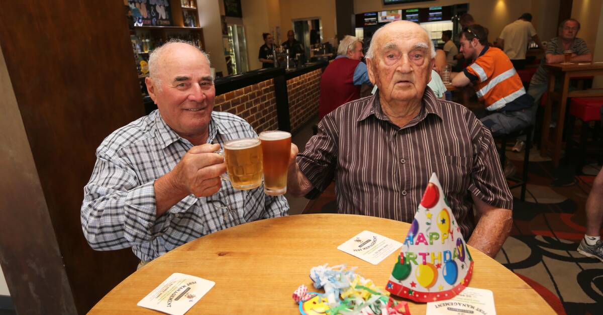 DRINKING BUDDIES: Erminio Pasin and his mate Gus Tomasella celebrate Errminio's 95th birthday at the Area Hotel where the pair has had a drink together every Saturday for the past 40 years. 