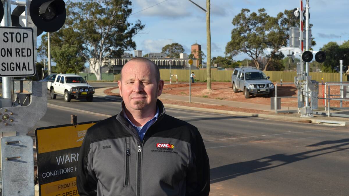 DON'T STOP: Councillor Simon Croce at the Kooringal Avenue level crossing that's causing confusion but set to save congestion.