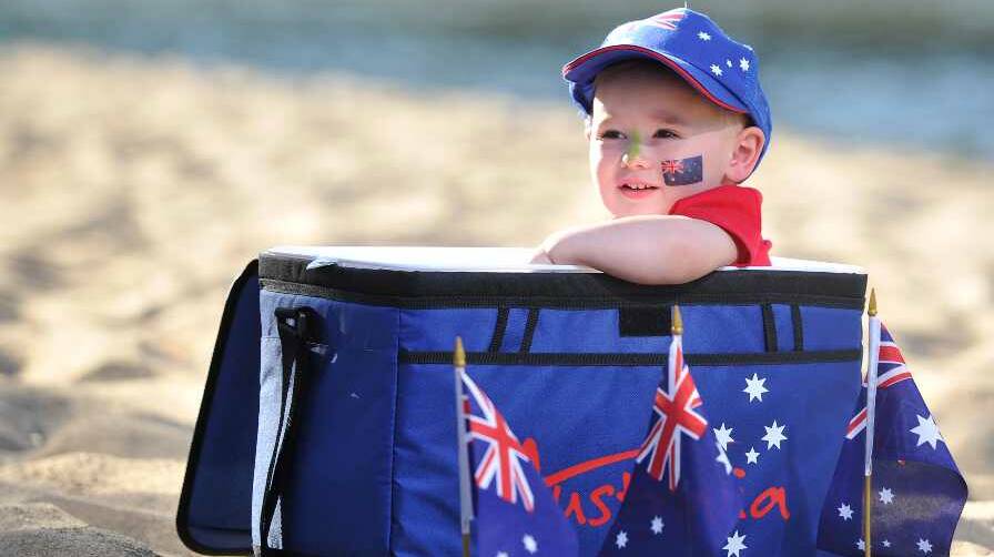 Toby Gannon, 18 months, finds a cool spot at Wagga Beach. Picture: Michael Frogley