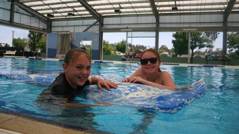 At the Junee Rec Centre are Makeeta Jenkins, 9, and Taylor Duck, 12. Picture: Declan Rurenga