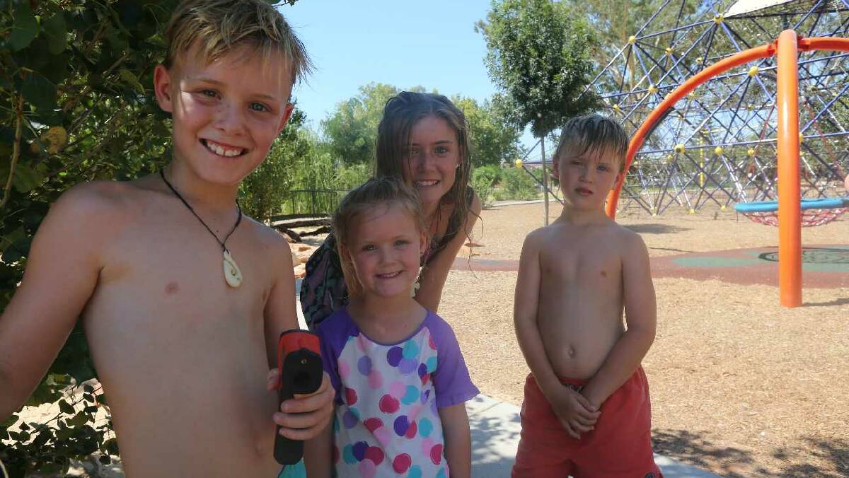 Harrison, 9, Matilda, 5, Ashley, 13, and Jack Dedman, 7, at City Park in Griffith. Picture: Anthony Stipo