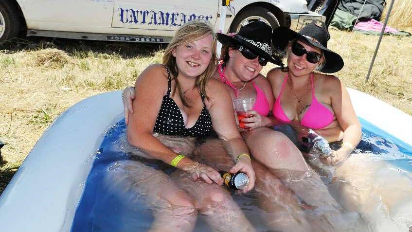 Sharnii Hinkley, Sarah-Jane Smith-Way and Jane Morris cool down in the Holbrook B&S car park. Picture: Alastair Brook