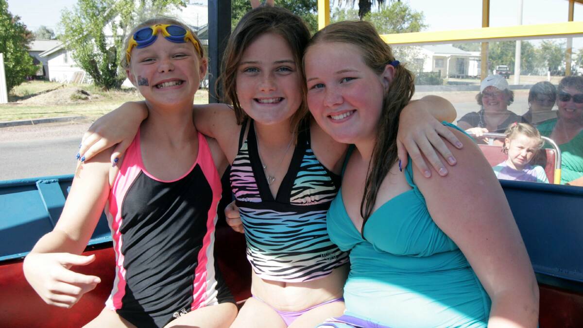 Georgina Richards, Kennedy Leach, Laura Shelton, all 12, at the pool party in Leeton on Australia Day. Picture: John Gray